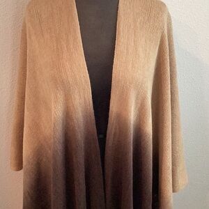 New with tags an ombre ruana wrap. Camel to dark chocolate brown.